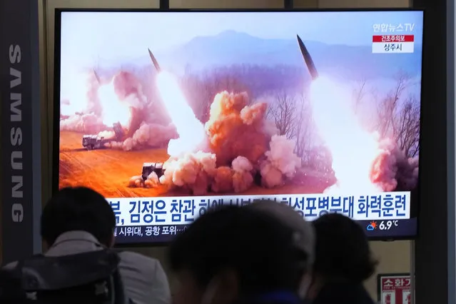A TV screen shows an image of North Korea's missiles launch during a news program at the Seoul Railway Station in Seoul, South Korea, Friday, March 10, 2023. North Korean leader Kim Jong Un supervised a frontline artillery drill simulating an attack on an unspecified South Korean airfield as he called for his troops to sharpen their combat readiness in the face of his rivals' “frantic war preparation moves”, state media said Friday. (Photo by Ahn Young-joon/AP Photo)
