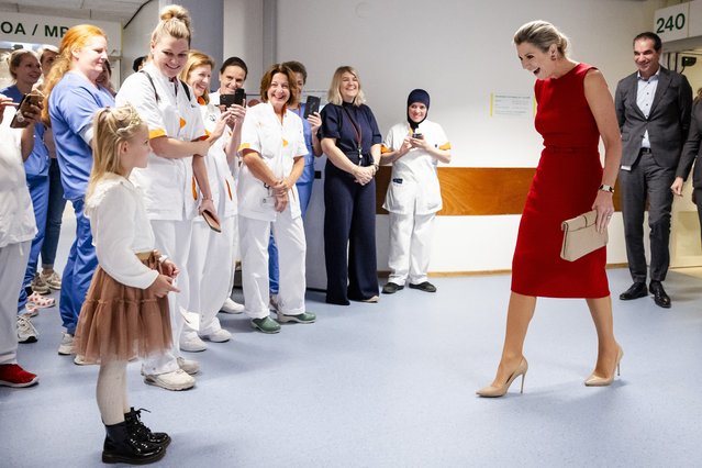 Dutch Queen Maxima (2ndL) attends a working visit to the Noordwest Hospital Group in Alkmaar on October 23, 2024. (Photo by Sem van der Wal/ANP via AFP Photo)