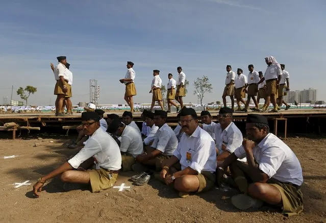 Volunteers of the Hindu nationalist organisation Rashtriya Swayamsevak Sangh (RSS) arrive to attend a conclave on the outskirts of Pune, India, January 3, 2016. (Photo by Danish Siddiqui/Reuters)