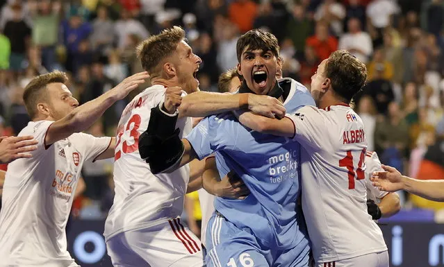 England’s goalkeeper James Mazarelo (C) celebrates with teammates after winning by shoot out the men’s semifinal match Germany vs England at the EuroHockey Championships 2023 in Moenchengladbach, Germany, 25 August 2023. (Photo by Ronald Wittek/EPA)