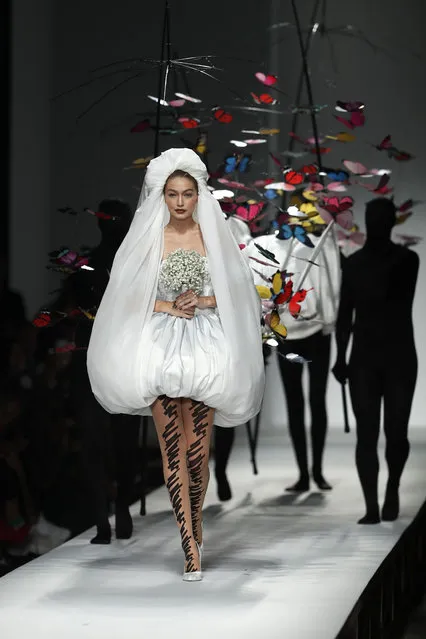 Model Gigi Hadid wears a creation as part of the Moschino women's 2019 Spring-Summer collection, unveiled during the Fashion Week in Milan, Italy, Thursday, September 20, 2018. (Photo by Antonio Calanni/AP Photo)