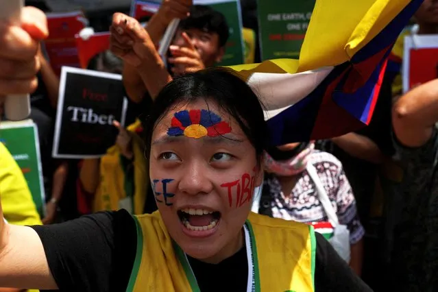 A member of the Tibetan community protests against the Chinese government at their refugee colony in Majnu ka Tilla ahead of the G20 summit in New Delhi, India on September 8, 2023. (Photo by Anushree Fadnavis/Reuters)