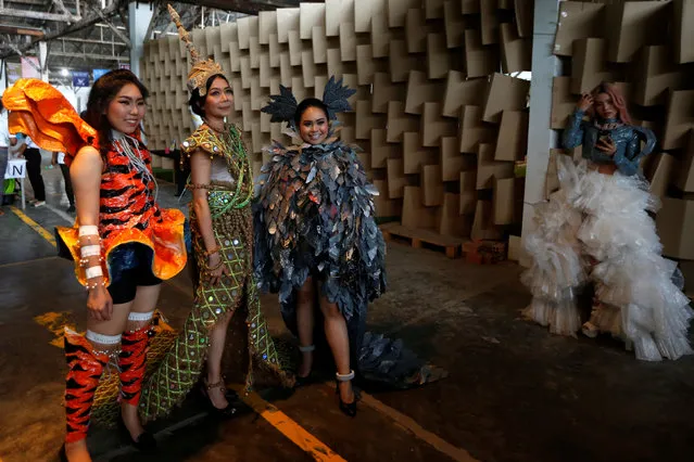 Models wear clothes made out of recycled materials during a show organised by LGBT fashion designers to battles discrimination in Phnom Penh, Cambodia, October 24, 2018. (Photo by Samrang Pring/Reuters)