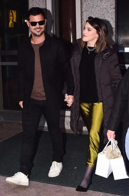 American actor Taylor Lautner and his wife, Taylor Lautner, hold hands on November 2, 2023 in New York City. (Photo by Patricia Schlein/Star Max/GC Images)