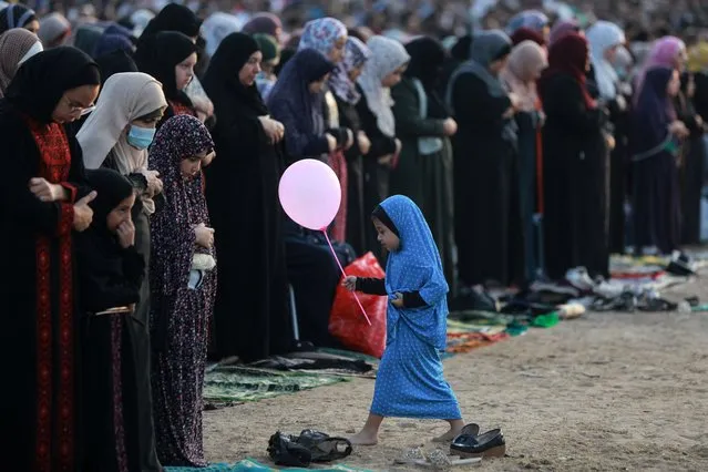 Palestinians attend special prayer on the first day of Muslim Eid Al Adha or “Festival of the Sacrifice” in Gaza city on July 20, 2021. (Photo by Majdi Fathi/NurPhoto/EPA/EFE/Rex Features/Shutterstock)