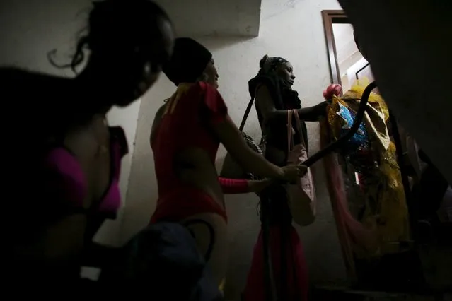 Dancers are seen at the backstage of a cinema where the “Cuerda Viva” (Live Strings) alternative music festival is taking place, in Havana, February 26, 2016. (Photo by Alexandre Meneghini/Reuters)