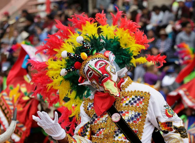 A Kusillo, member of Waca Waca group performs during the carnival parade in Oruro, Bolivia February 25, 2017. (Photo by David Mercado/Reuters)