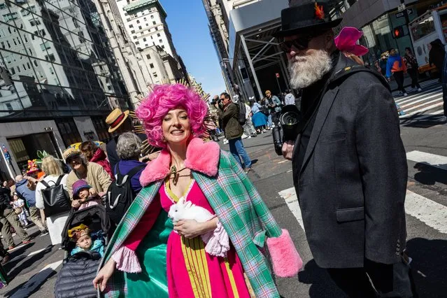 People walk in the Easter parade outside Saint Patrick's Cathedral on March 31, 2024 in New York City. (Photo by Stephanie Augello/Rex Features/Shutterstock)