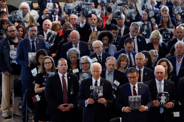 U.S. President Joe Biden holds a photograph of Holocaust victims on the day he addresses rising levels of antisemitism, at the U.S. Holocaust Memorial Museum's Annual Days of Remembrance ceremony, at the U.S. Capitol building in Washington, U.S., May 7, 2024. (Photo by Evelyn Hockstein/Reuters)