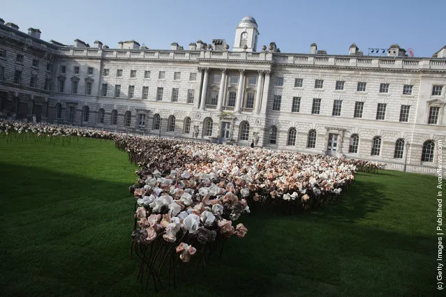 'Out of Sync' art installation on a grass meadow at Somerset Housein London