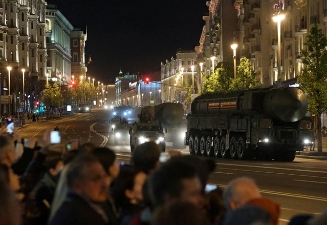 A Russian Yars intercontinental ballistic missile system and other armoured vehicles drive along a street during a rehearsal for a military parade marking the anniversary of the victory over Nazi Germany in World War Two in Moscow, Russia on May 4, 2023. (Photo by Yulia Morozova/Reuters)