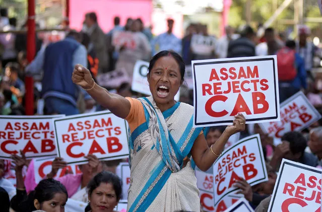 A woman shouts slogans during a protest against the Citizenship Amendment Bill, a bill approved by India's cabinet to give citizenship to religious minorities persecuted in neighboring Muslim countries, in Guwahati, India, December 5, 2019. (Photo by Anuwar Hazarika/Reuters)