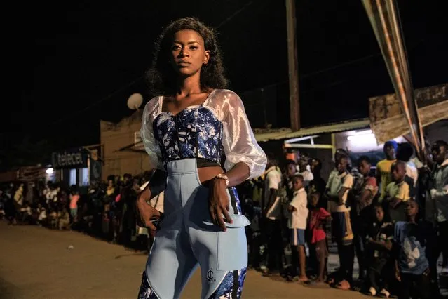 A model wears a dress by designer Austin Loïc Ayih-Yenu during the third edition of the Ouaga Fashion Week in Ouagadougou, Burkina Faso, Saturday, May 14, 2022. (Photo by Sophie Garcia/AP Photo)