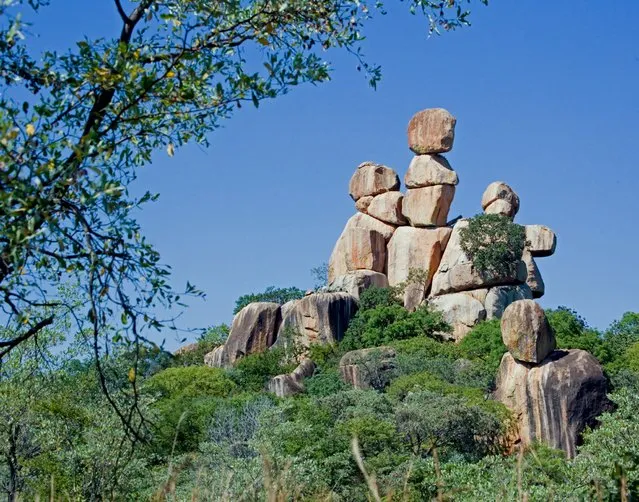 Mother and Child balancing Rocks in Matopos National Park, Zimbabwe