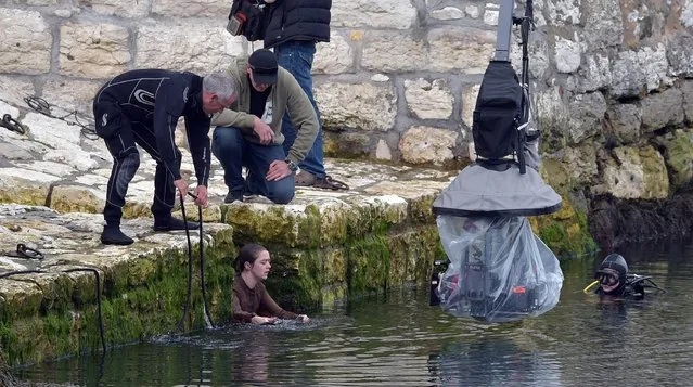 Maisie Williams, who plays Ayra Stark on Game of Thrones, is filmed during a water scene for the new series on August 17, 2015 in Carnlough, Northern Ireland. HBO produced fantasy adventure television series Game of Thrones is largely filmed in the province and according to recent audited figures from Northern Ireland Screen, the television drama has contributed an estimated £110m to the Northern Ireland economy. (Photo by Charles McQuillan/Getty Images)