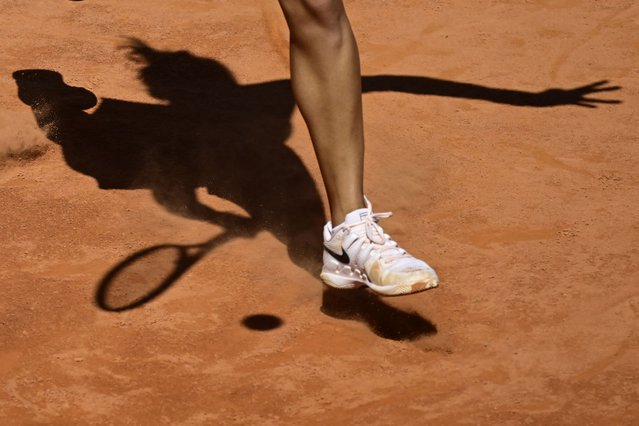 Picture of the shadow of China's Qinwen Zheng during her match against Czech Republic's Linda Noskova at the Women's WTA Rome Open tennis tournament at Foro Italico in Rome on May 11, 2024. (Photo by Tiziana Fabi/AFP Photo)