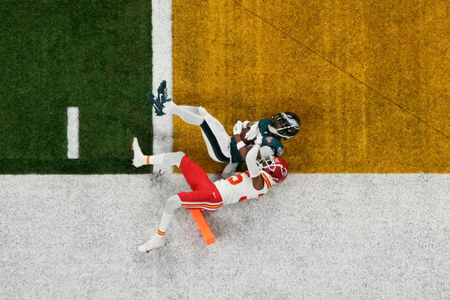Philadelphia Eagles wide receiver Jahan Dotson (83) is tackled short of the goal line by Kansas City Chiefs cornerback Jaylen Watson (35) during the first half of the NFL Super Bowl 59 football game, Sunday, February 9, 2025, in New Orleans. (Photo by David J. Phillip/AP Photo)