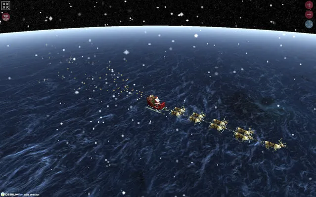 In what’s become its own wildly popular tradition, the Colorado-based North American Aerospace Defense Command provides real-time updates on Santa’s progress December 24, from 4 a.m. to midnight MST as he transits the South Pacific, Asia, Africa, Europe and the Americas. (Photo by AP Photo)