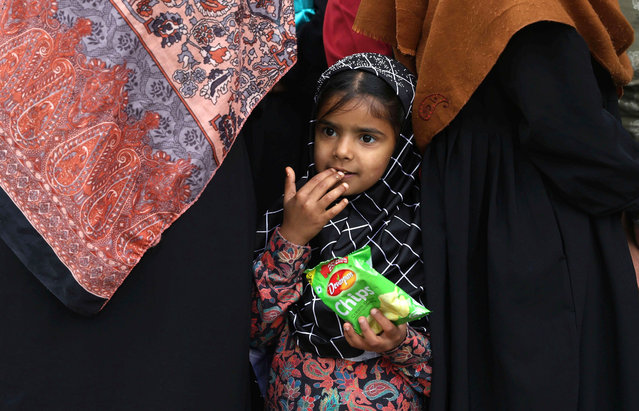 A Kashmiri girl waits for transportation as she, along with her family, leaves for a safer place following overnight shelling, in Uri, India-administered Kashmir, 09 May 2025. According to the Indian Ministry of Defense, on the night of 07 and 08 May 2025, Pakistan attempted to engage a number of military targets in northern and western India using drones and missiles, and in response, Indian armed forces targeted air defence radars and systems at a number of locations in Pakistan. (Photo by Farooq Khan/EPA/EFE)