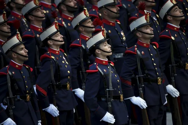 Members of the Spanish armed forces take part in a military parade marking Spain's National Day in Madrid October 12, 2015. (Photo by Susana Vera/Reuters)