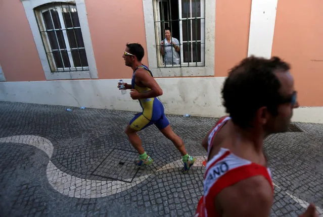 Participants run as they take part in a triathlon in Cascais, Portugal, September 24, 2016. (Photo by Rafael Marchante/Reuters)
