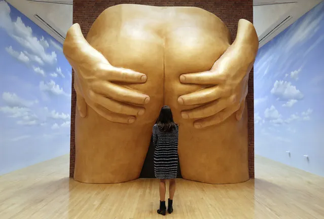 A woman looks towards part of an artwork called “Lichen! Libido! (London!) Chastity!” by Anthea Hamilton, one of the four artists shortlisted for the Turner Prize 2016, as it is displayed at the Tate Britain gallery in London, Monday, September 26, 2016. The Turner Prize aims to promote public debate around new developments in contemporary British art. (Photo by Kirsty Wigglesworth/AP Photo)