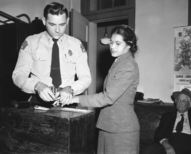 Rosa Parks, whose refusal to move to the back of a bus, touched off the Montgomery bus boycott and the beginning of the civil rights movement, is fingerprinted by police Lt. D.H. Lackey in Montgomery, Ala., February 22, 1956. She was among some 100 people charged with violating segregation laws. (Photo by Gene Herrick/AP Photo)