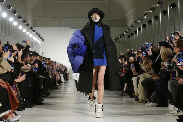 A model wears a creation for the Comme des Garcons ready-to-wear fall/winter 2018/2019 fashion collection presented in Paris, Saturday March 3, 2018. (Photo by Thibault Camus/AP Photo)