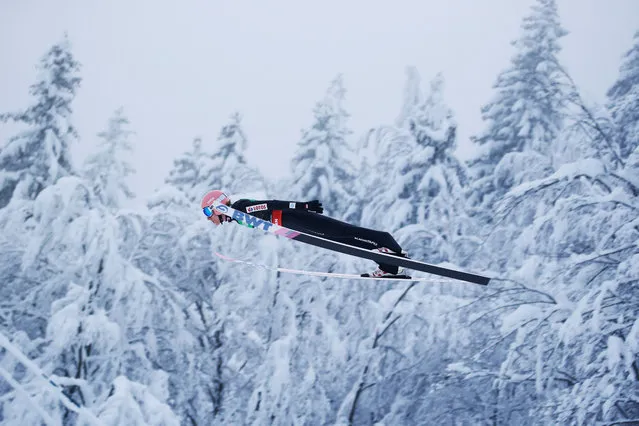Poland's Dawid Kubacki flies through the air during his first jump at the Ski Flying World Championships in Planica, Slovenia on December 11, 2020. (Photo by Srdjan Zivulovic/Reuters)