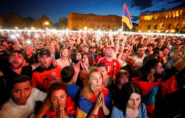 Supporters of Armenian opposition leader Nikol Pashinyan react, after his bid to be interim prime minister was blocked by the parliament, during a rally in central Yerevan, Armenia, May 1, 2018. (Photo by Gleb Garanich/Reuters)