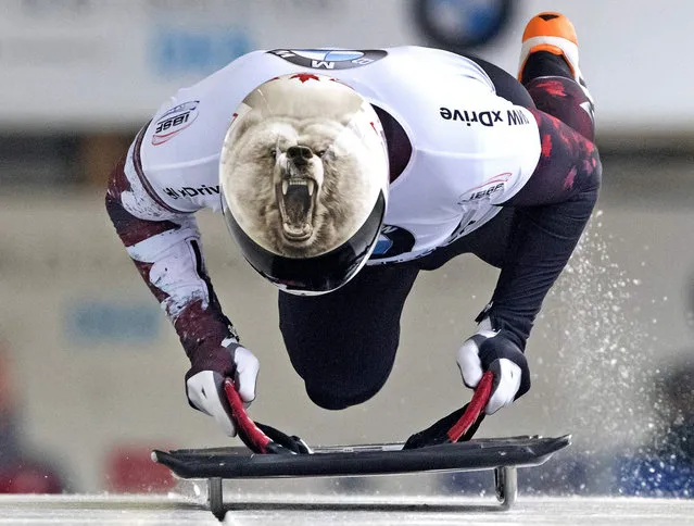 Barrett Martineau of Canada jumps on the skeleton during the men's race at the Skeleton World Cup in Altenberg, eastern Germany, Saturday, November 28, 2015. (Photo by Jens Meyer/AP Photo)