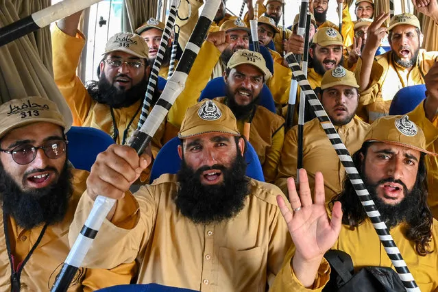 Activists of Jamiat-ul-Ulama-i-Islam chant slogans as they participate in a rally held in Islamabad on May 15, 2023. (Photo by Abdul Majeed/AFP Photo)