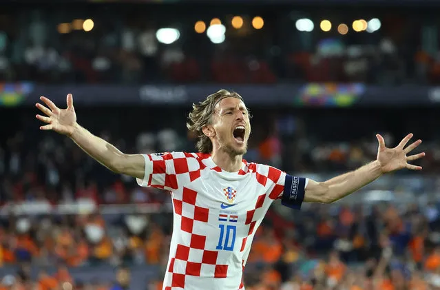 Luka Modric of Croatia celebrates Bruno Petkovic's goal with the players' bench, but the goal is eventually disallowed by VAR for offside after the UEFA Nations League 2022/23 semifinal match between Netherlands and Croatia at De Kuip on June 14, 2023 in Rotterdam, Netherlands. (Photo by Wolfgang Rattay/Reuters)