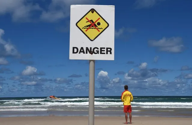 A surf rescue boat searches Shelly Beach near Ballina in far northern New South Wales, Australia, 09 February 2015. A surfer in Australia died on 09 February 2015 morning after a shark bit off both of his legs, local media reported. The man was surfing off Shelly Beach, a popular tourist area in New South Wales. (Photo by Dave Hunt/EPA)