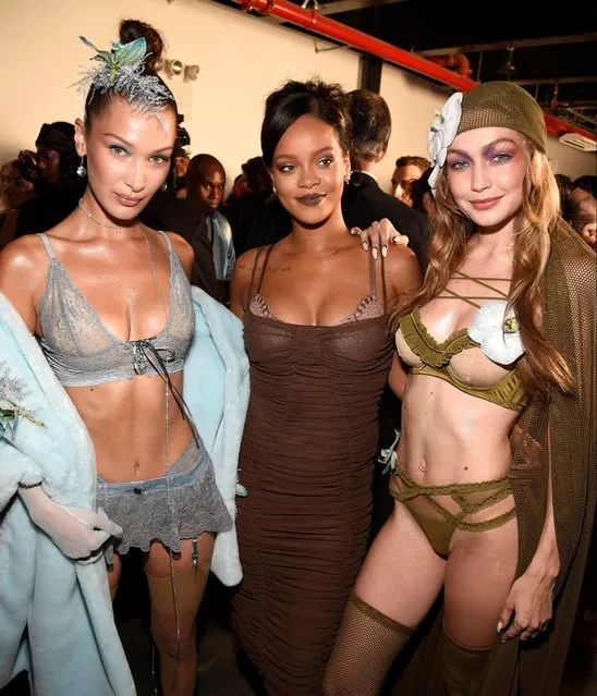 Bella Hadid, Rihanna and Gigi Hadid pose backstage for the Savage X Fenty Fall/Winter 2018 fashion show during NYFW at the Brooklyn Navy Yard on September 12, 2018 in Brooklyn, NY. (Photo by Kevin Mazur/Getty Images for Savage X Fenty)