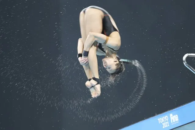 Pandelela Pamg of Malaysia performs a dive during the Women's 10m Platform final at the FINA Diving World Cup in Tokyo, Wednesday, May 5, 2021. Pandelela won the gold medal in the event. (Photo by Koji Sasahara/AP Photo)