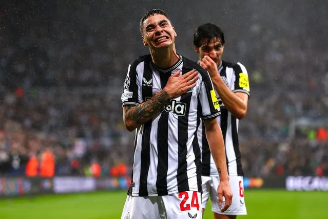 Miguel Almiron of Newcastle United celebrates after scoring his team's first goal during the UEFA Champions League match between Newcastle United FC and Paris Saint-Germain at St. James Park on October 4, 2023 in Newcastle upon Tyne, United Kingdom. (Photo by Ryan Crockett/DeFodi Images via Getty Images)