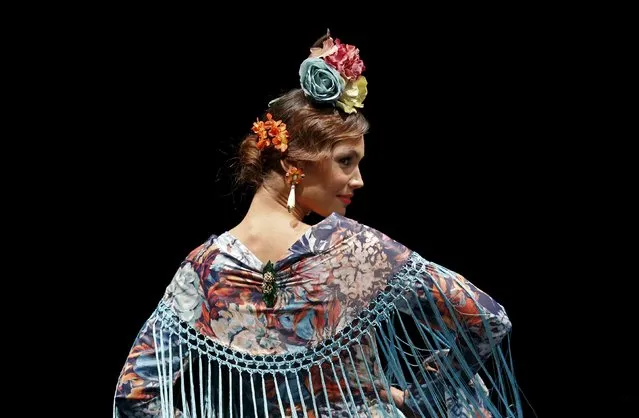 A model presents a creation by Arte y Compas during the International Flamenco Fashion Show (SIMOF) in the Andalusian capital of Seville, southern Spain, February 5, 2016. (Photo by Marcelo del Pozo/Reuters)