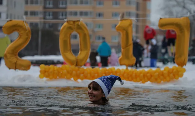 A participant takes part in a festival of winter swimming in the town of Podolsk, south of Moscow, Russia January 5, 2017. (Photo by Maxim Shemetov/Reuters)