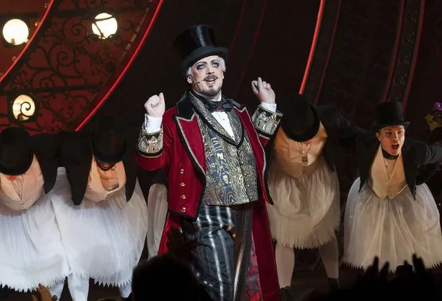 Boy George, center, is pictured on stage during the curtain call for his debut performance in “Moulin Rouge! The Musical” at the Al Hirschfeld Theatre on Tuesday, February 6, 2024, in New York. (Photo by Evan Agostini/Invision/AP Photo)