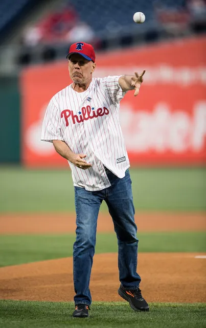Actor Bruce Willis throws ceremonial pitch at the Milwaukee Brewers v Philadelphia Phillies game at Citizens Bank Park on May 15, 2019 in Philadelphia, Pennsylvania. (Photo by Gilbert Carrasquillo/Getty Images)