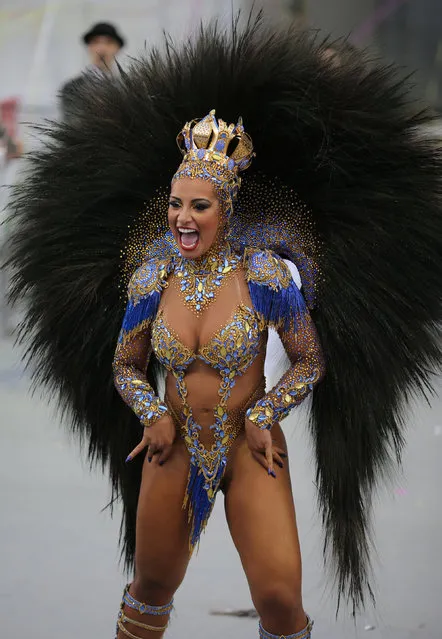 A reveller parades for the Aguia de Ouro samba school during the carnival in Sao Paulo, Brazil, February 25, 2017. (Photo by Paulo Whitaker/Reuters)