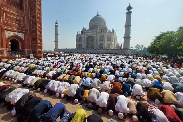 Muslim devotees offer Eid al-Fitr prayers, which marks the end of the holy fasting month of Ramadan, inside the complex of Taj Mahal in Agra on April 11, 2024. (Photo by Pawan Sharma/AFP Photo)