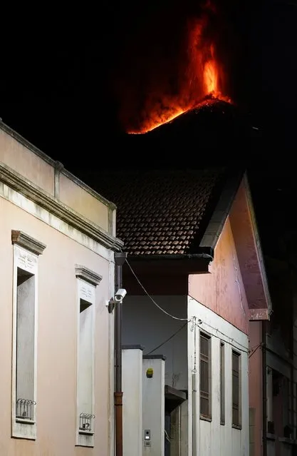 Eruption of the South East volcano of Etna is seen from the village of Nicolosi, Italy February 10, 2022. (Photo by Antonio Parrinello/Reuters)