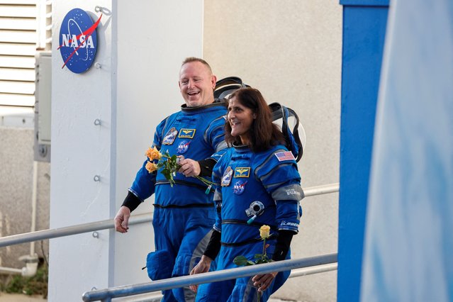 NASA astronauts Butch Wilmore and Suni Williams walk at NASA's Kennedy Space Center, ahead of Boeing's Starliner-1 Crew Flight Test (CFT) mission on a United Launch Alliance Atlas V rocket to the International Space Station, in Cape Canaveral, Florida, U.S., June 5, 2024. (Photo by Joe Skipper/Reuters)