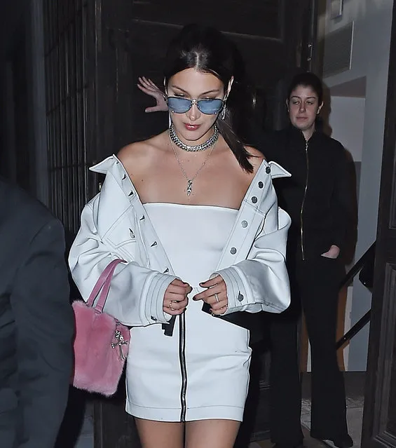 Bella Hadid seen leaving a photo shoot in all white outfit in New York, NY on April 6, 2017. (Photo by Splash News and Pictures)