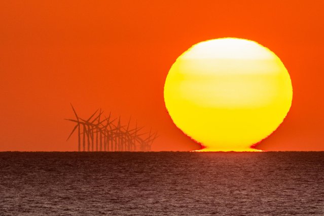 Sunset on the Lancashire coast near Blackpool, England on July 7, 2019. (Photo by Stephen Cheatley/Bav Media)
