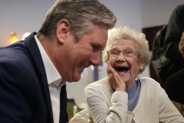 Sir Keir Starmer chats to Gladys Hall, 92, as he visits a pensioners drop-in session in Wakefield. He was keen to talk about the increased cost of living and the priorities for local people, during local election campaigning, at Horbury Working Members Club, Cluntergate on May 4, 2022 in Wakefield, England. (Photo by Christopher Furlong/Getty Images)