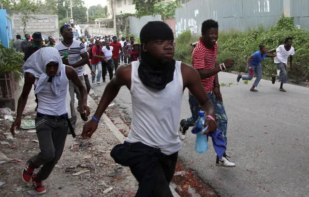 People protest against Haiti's interim president Jocelerme Privert in Port-au-Prince, Haiti, June 7, 2016. (Photo by Jeanty Junior Augustin/Reuters)