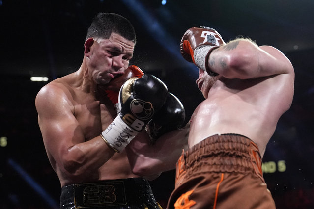 Canelo Alvarez lands a right to Edgar Berlanga in a super middleweight title bout Saturday, September 14, 2024, in Las Vegas. (Photo by John Locher/AP Photo)